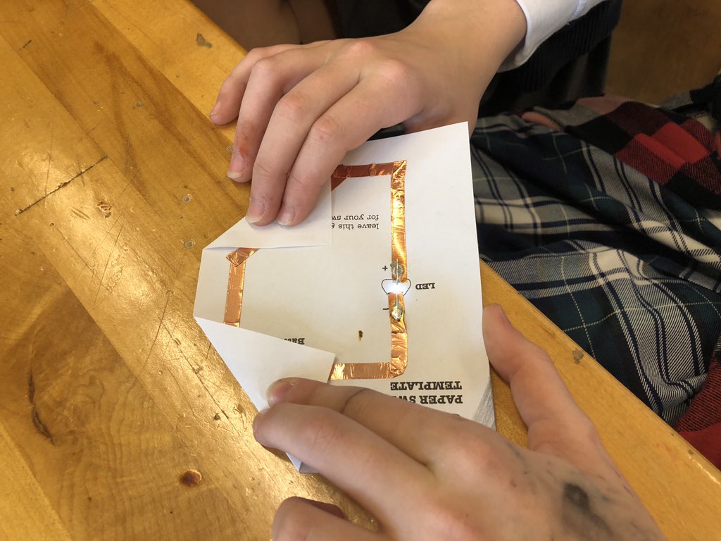Class VII <a href="/MarymountNY/">Marymount School NY</a> built #paperCircuit switches using the <a href="/chibitronics/">chibitronics</a> template, conductive copper and fabric tapes, then soldered a prototyping LED into the circuit before lighting it up with a 2032 battery. #makered