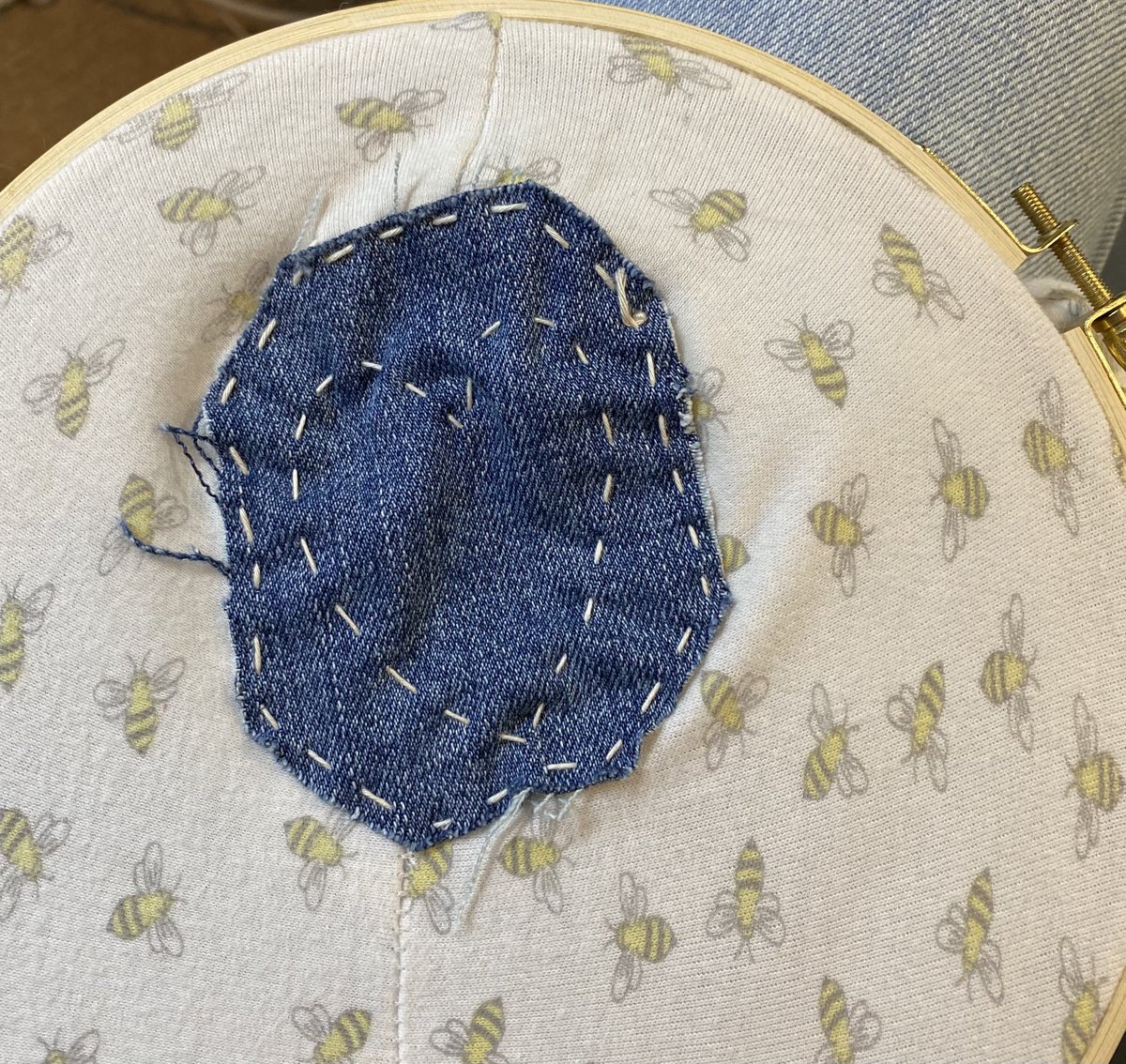 Sashiko-stitched patch of denim over a cotton item. 20 minutes