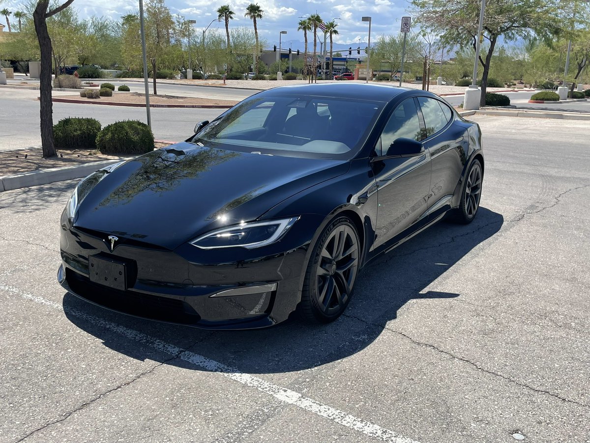 BadgerMaier's tweet photo. Goodbye Hellcat, welcome Plaid. @elonmusk @Tesla @Dodge https://t.co/Xg65XzlEGD