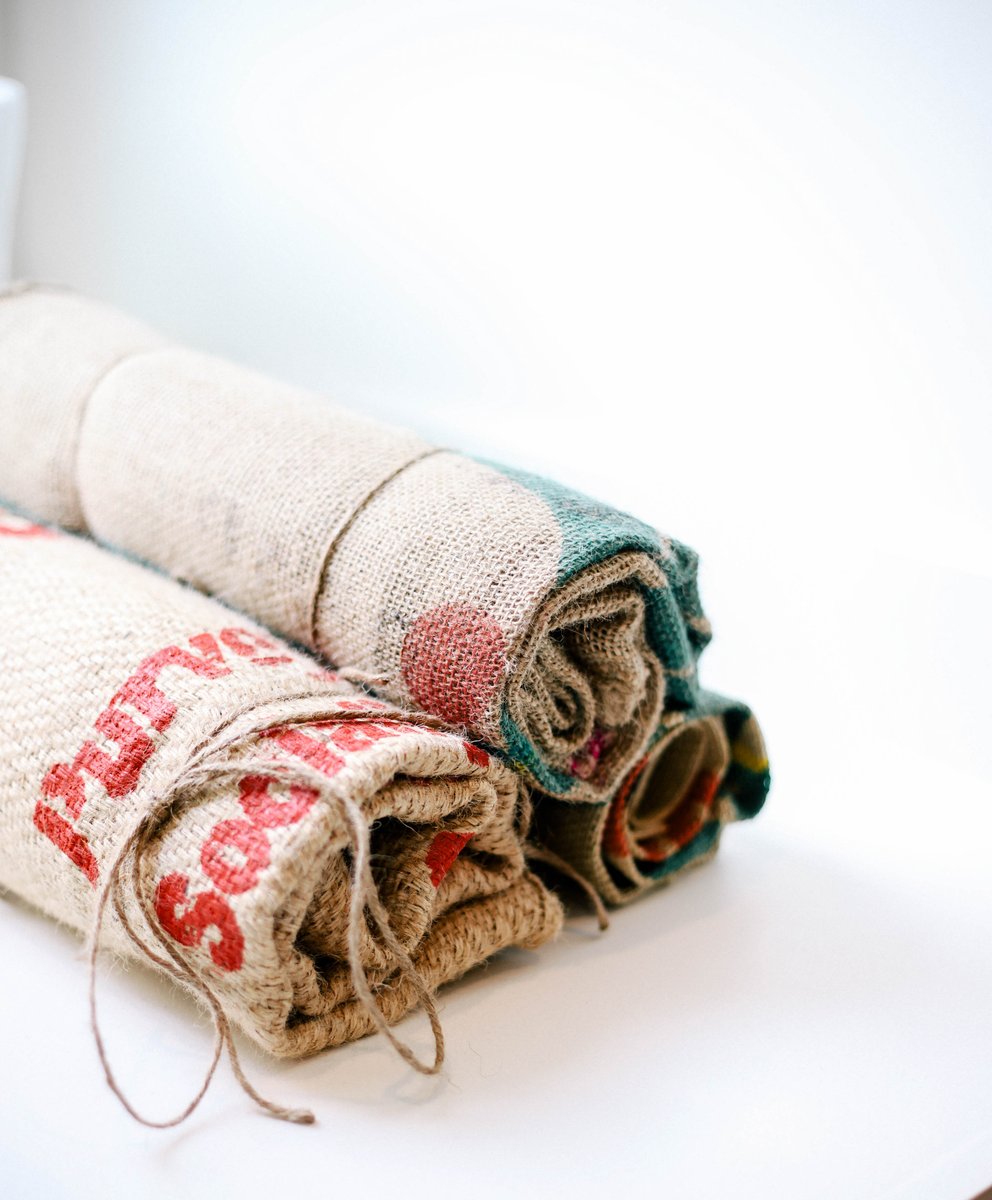 Calling all coffee lovers! Green coffee bags are gorgeous and unique, each one a different style. You can buy these from us right at our coffee shop and turn one into a creative piece of art, a wall hanging, or something else. We can’t wait to see what you come up with!