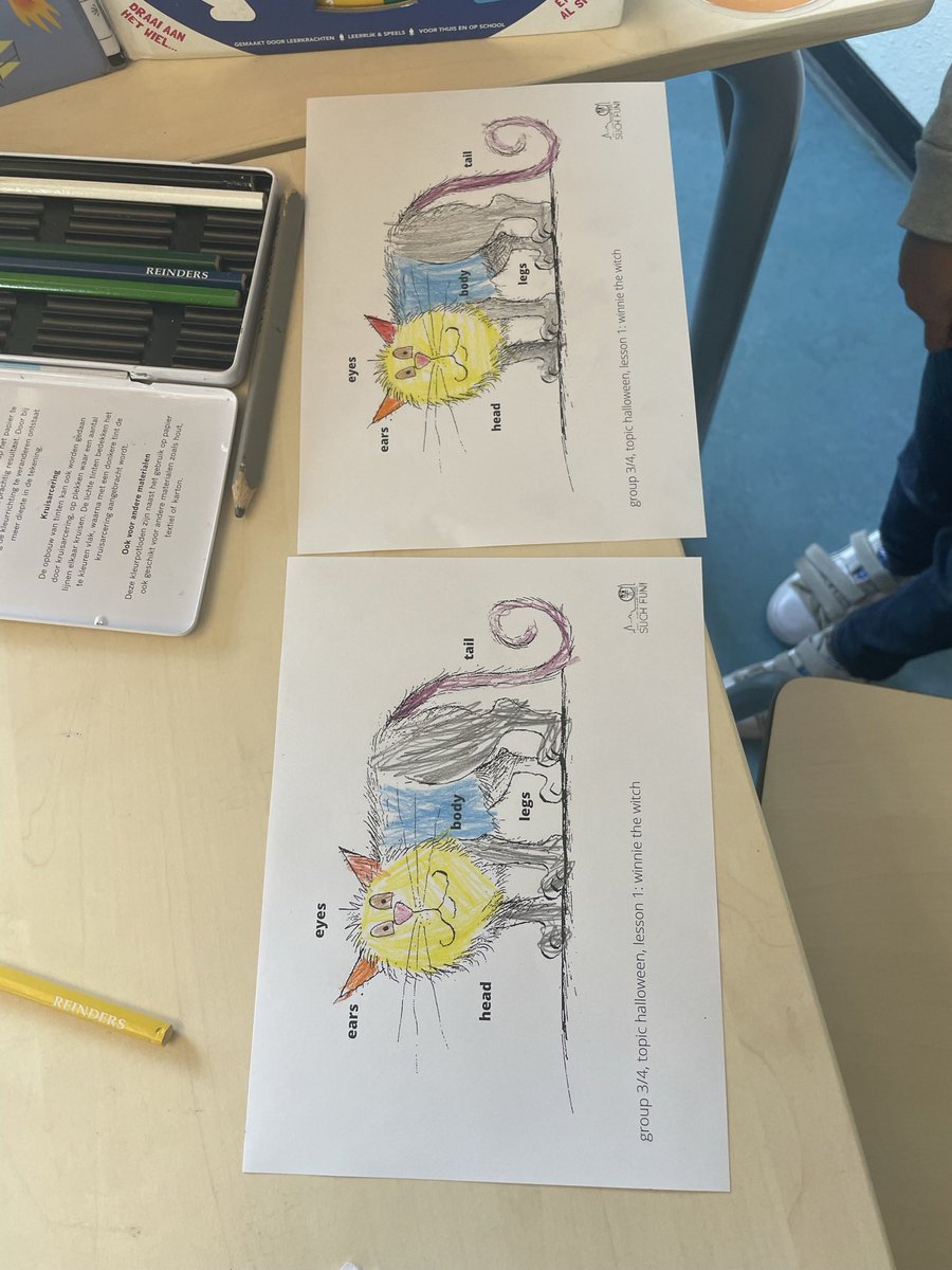 MissMorgan_SF's tweet photo. This week the theme is Halloween and group 3/4 are learning about Winnie the Witch! These are some of the pupils own Wilbur the cat. Working together in pairs and speaking in English. Good work everyone! https://t.co/HL7X8p2ZYM