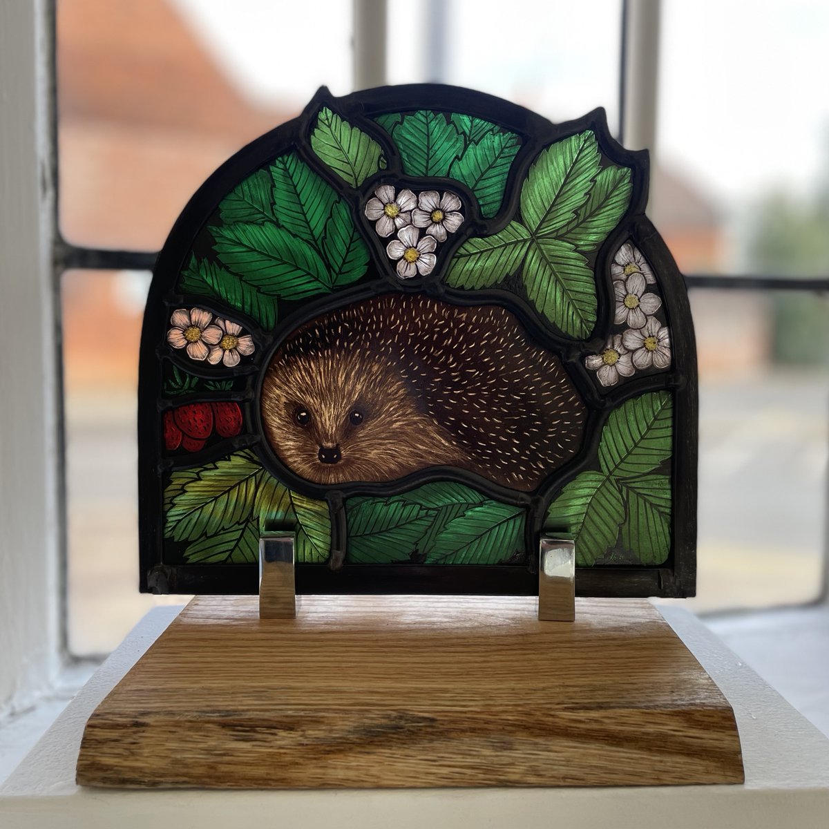 'Hedgehog in the Wild Strawberries' - painted and stained kiln fired glass. Currently in my exhibition 'Two Hedges' at <a href="/newashgate/">New Ashgate Gallery</a> which finishes on Saturday 5th November.

#stainedglass #stainedglassartist #glassart #hedgehogs #hedgehog #ukwildlife #wildlife
