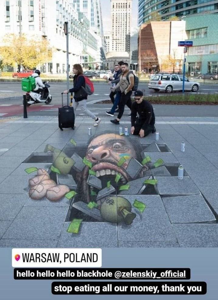 В Варшаве нарисовали 3D-граффити с Владимиром 'Чёрная дыра' Зелей. 'Хватит съедать все наши деньги, спасибо' — подписали художники. (с инета)