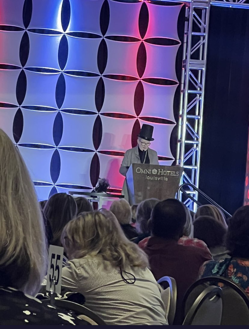 Mrs. Johna Rodgers who serves as the current GPA President (hence the hat) addresses the 2022 GPA Conference crowd! Thanks for all you do, Johna! <a href="/GRRECKY/">GRRECKY</a> is proud of you, friend! Great start to the #GPAconf2022 in Louisville, KY!