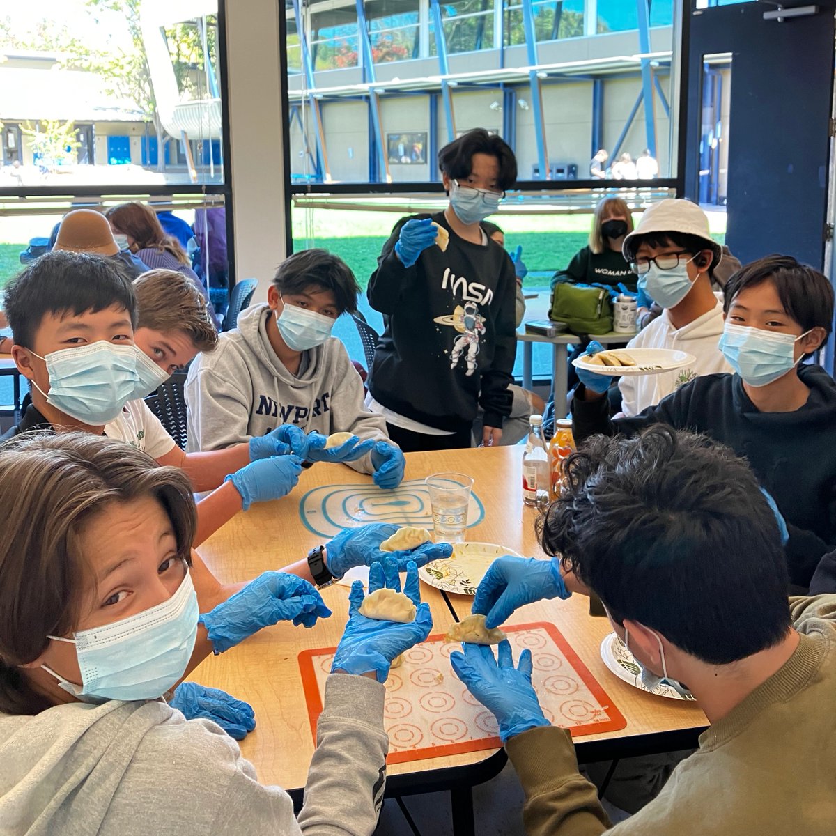 bentleyschool's tweet photo. The Asian Pacific Culture Club (APCC) made dumplings during the club meeting last Wednesday led by sophomore leaders Clifton C. and Lucy B! #thebentleyschool https://t.co/2FMV8yOUh8