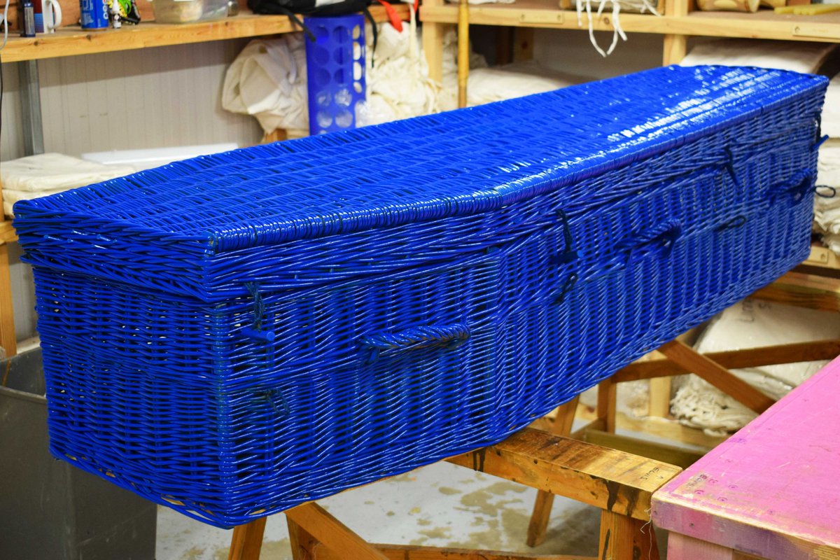 EcoffinsUK's tweet photo. A very glossy-looking painted Willow Highsted ready for dispatch in the workshop today. This rich, deep blue colour paint has been achieved using eco-friendly paints. We can custom colour of coffins to families wishes to create something unique to them #bespokeorders https://t.co/xUlLRQsvfb