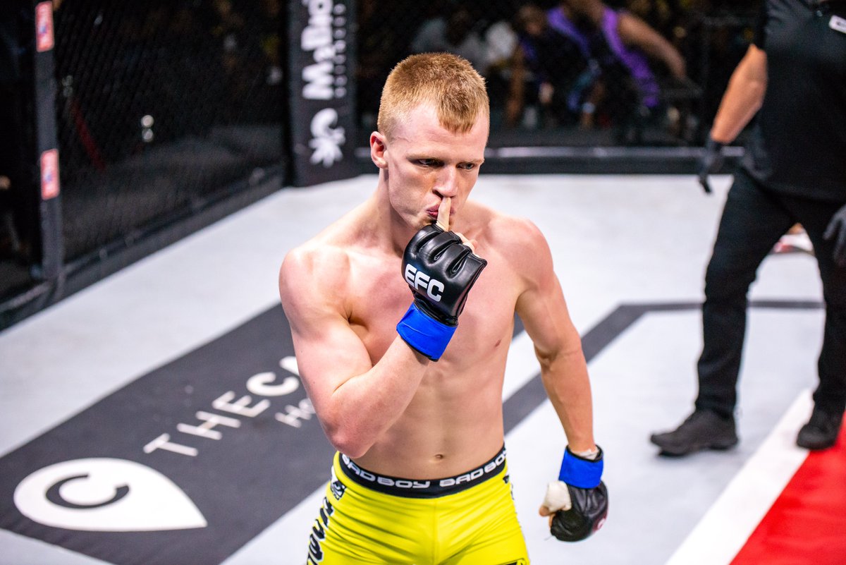 EFCworldwide's tweet photo. 'The Punisher' makes it 1 out of 3 for Morne Swanepoel's boys! 😤
Katikati and Dylan Swanepoel still to come!
#EFC99 https://t.co/ThFTT5Bwdl