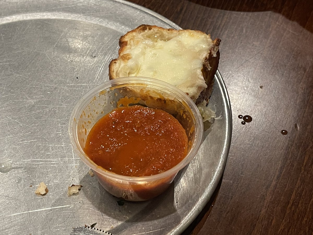 Do you see what we see 👀? Spotted this Hidden Mickey while eating garlic knots at our local pizzeria! #hiddenmickeys #garlicknots