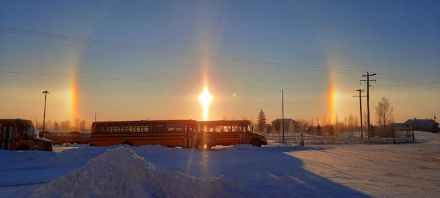 chipmand's tweet photo. Let's hope these sundogs don't mean more snow. Either way they look great. Thanks Transportation and bus drivers for keeping kids safe during winters bite. https://t.co/UOHIY3sX9j