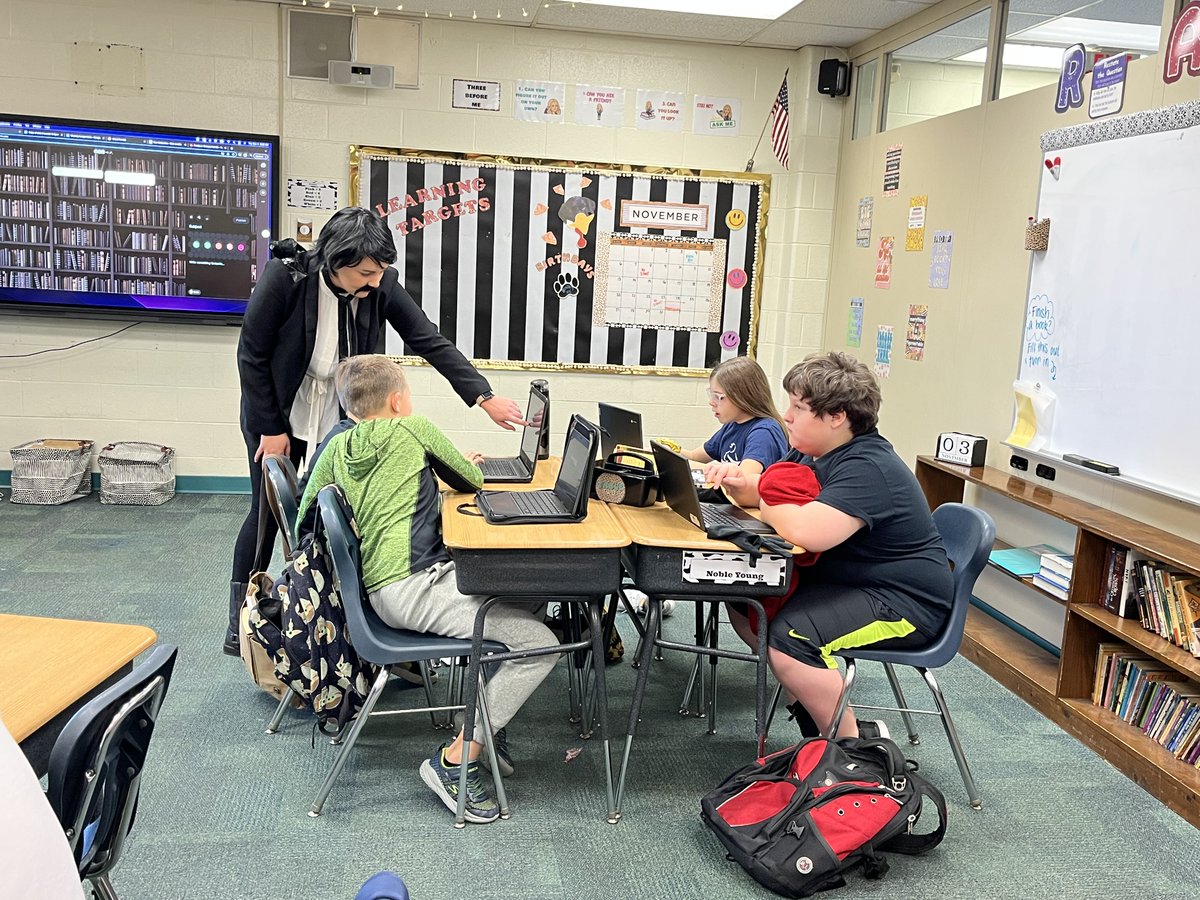 NREVSD's tweet photo. (2 of 2) Dressed as Edgar Allan Poe, @NREVSD_Monroe  fifth-grade teachers Tracy Lindner and Riley Nort launch head first into their poetry unit with a reading of “The Raven” closely followed by Michael Jackson’s Thriller lyrics. Good Stuff!  #WeAreNR https://t.co/VQOUkTktKn
