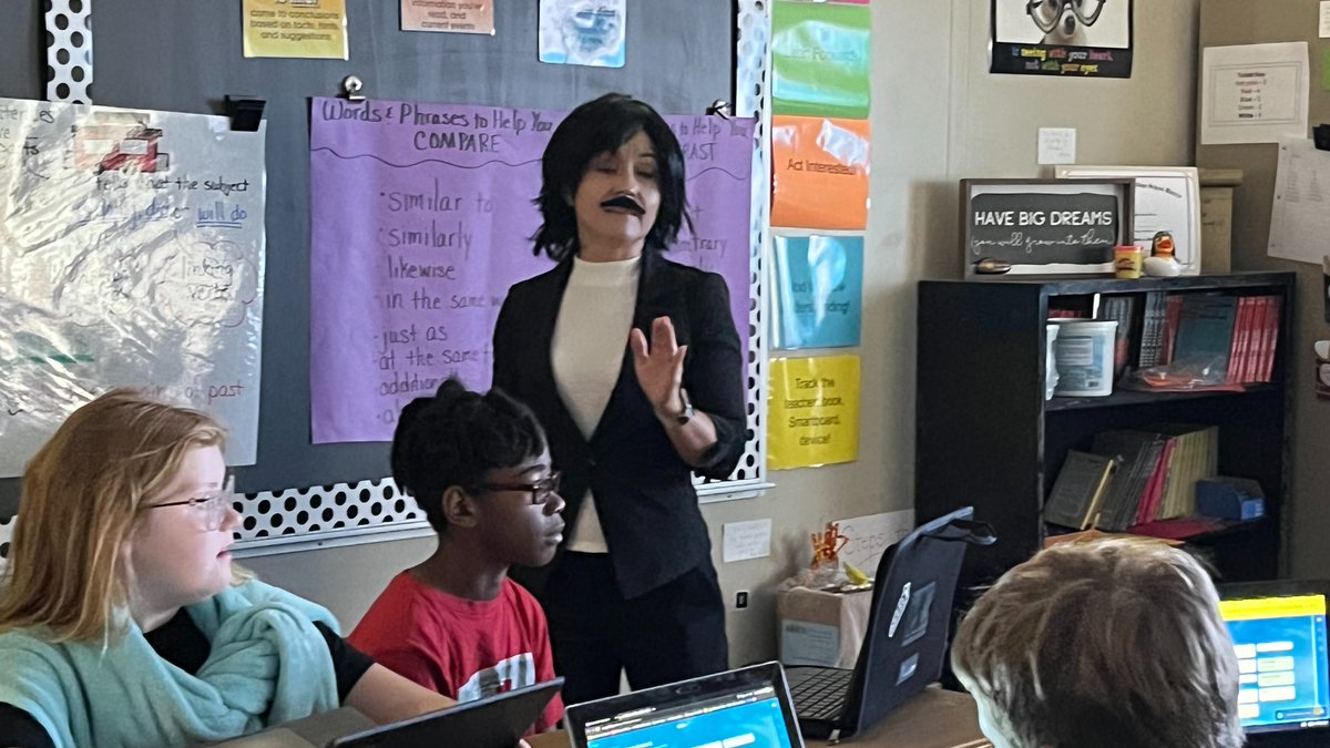 NREVSD's tweet photo. (2 of 2) Dressed as Edgar Allan Poe, @NREVSD_Monroe  fifth-grade teachers Tracy Lindner and Riley Nort launch head first into their poetry unit with a reading of “The Raven” closely followed by Michael Jackson’s Thriller lyrics. Good Stuff!  #WeAreNR https://t.co/VQOUkTktKn