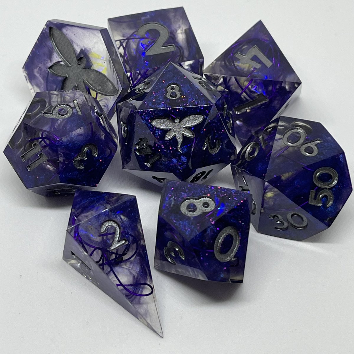 ArcaneFey's tweet photo. In celebration of my birthday today, I’m running a sale!!! 33% of on my website, and 30% off on Etsy (if only Etsy would let me do 33% 😫) Here’s to 33! 🥳 Sale ends tomorrow! #dice #dicesale #handmadedice #dnd https://t.co/EIq3XsxaO1