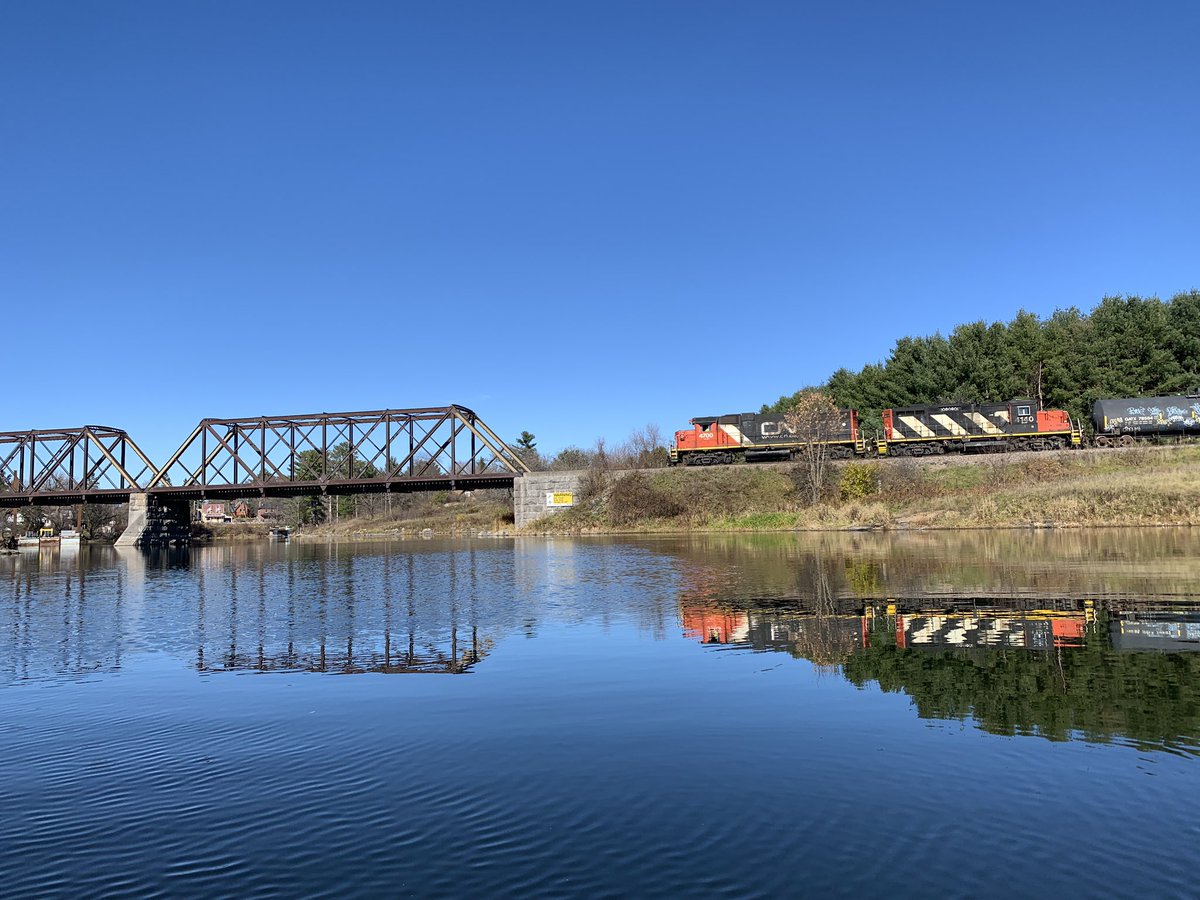 IrishKozak's tweet photo. The CN Freight train crossing the Mississippi River at Galetta, November 2, 2022. It is on its way to service the Nylene Canada Plant in Arnprior. Taken from my kayak. #trains #Ottawa #Galetta #Mississippi #ottcity #Ottcity #Ottnews #ottnews https://t.co/wiGyTn1vc3