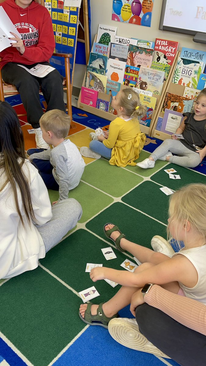 NCHSPreschool's tweet photo. Pairing pictures with words during a story lesson with Ms Caitlyn #fallweek #partnersingrowth @NCHSRedhawksCTE @NCHSOFFICIAL https://t.co/Ghkpk92tlR