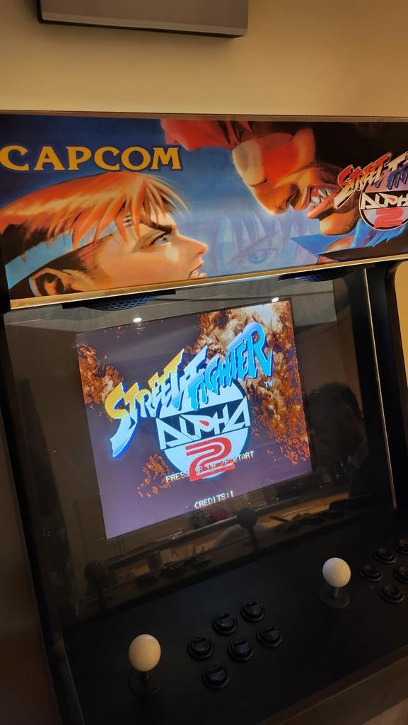 SatsuiH's tweet photo. The Arcade machine is finally complete thanks to the amazing marquee graphics from @jedimonkey1973 🔥🔥
.
#RETROGAMING
#StreetFighter #arcade #alpha2 
#retrogames #videogames 
. https://t.co/bzXypS6niD
