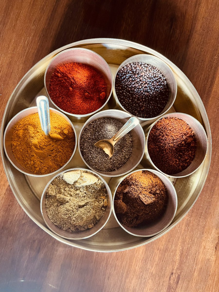 ShefVaidya's tweet photo. I love the beauty of handmade things. This hand-beaten brass masala dabba is a local #madeinpune product hand-crafted in तांबट आळी. Love the burnished glow that sets off the vivid colour of the spices. https://t.co/zGeK5LHUgG
