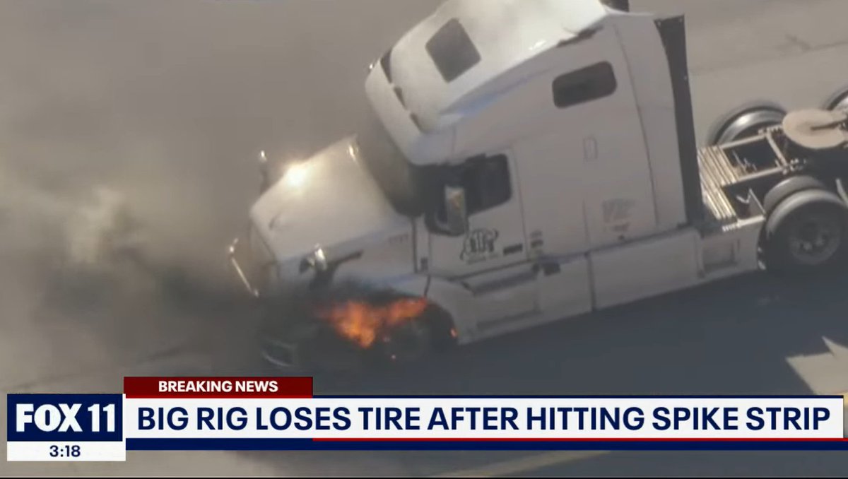 The truck is now on fire and the driver appears to be surrendering | LIVESTREAM: breaking911.com/calif-police-c…