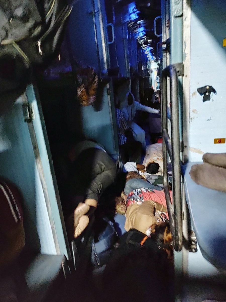 devendrabhide's tweet photo. @IRCTCofficial @WesternRly @drmbct @AshwiniVaishnaw @narendramodi 
Unreserved passengers travelling in reservation coaches. Occupying entire gangway. What about passenger safety?? PNR 8154422875 https://t.co/ORiG8Yn5LX