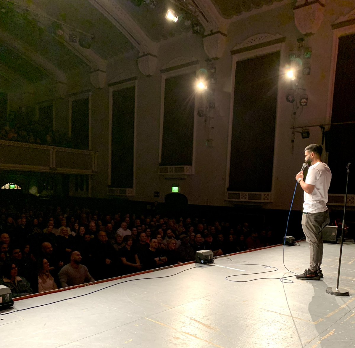paulchowdhry's tweet photo. Incredible audience in Dudley @BoroughHalls tonight, apart from the kutha who tried to impress us with his car collection, while wearing 15 coats. He had to be destroyed. https://t.co/UBF8FC3cdU