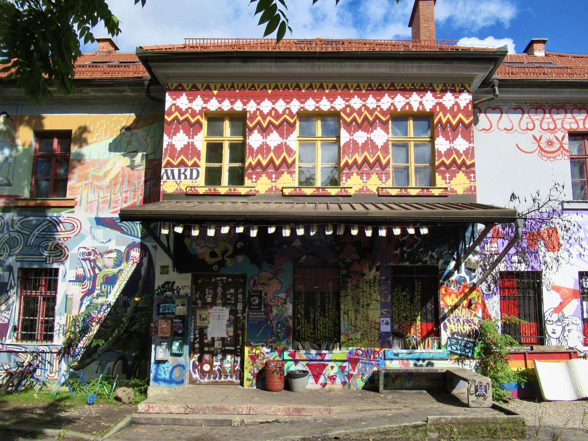 ChrisJSharm's tweet photo. The bus arrived in #Ljubljana at 3:00am. 😴 I was staying at a hostel in #Metelkova, which was a five minute walk from the station. Under cover of darkness I couldn’t see how eccentric the area was. In the morning I got such a surprise when I saw the buildings. 😍 https://t.co/VA4P8K3Dty