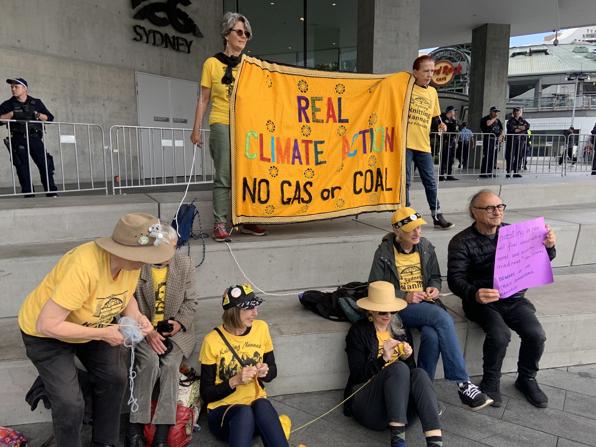 209alanandjanet's tweet image. Nannas settling in for some speeches, drumming &amp;amp; knitting.  Darling Harbour #IMARC. With other activist groups, &amp;amp; 100s of bored cops lurking.
