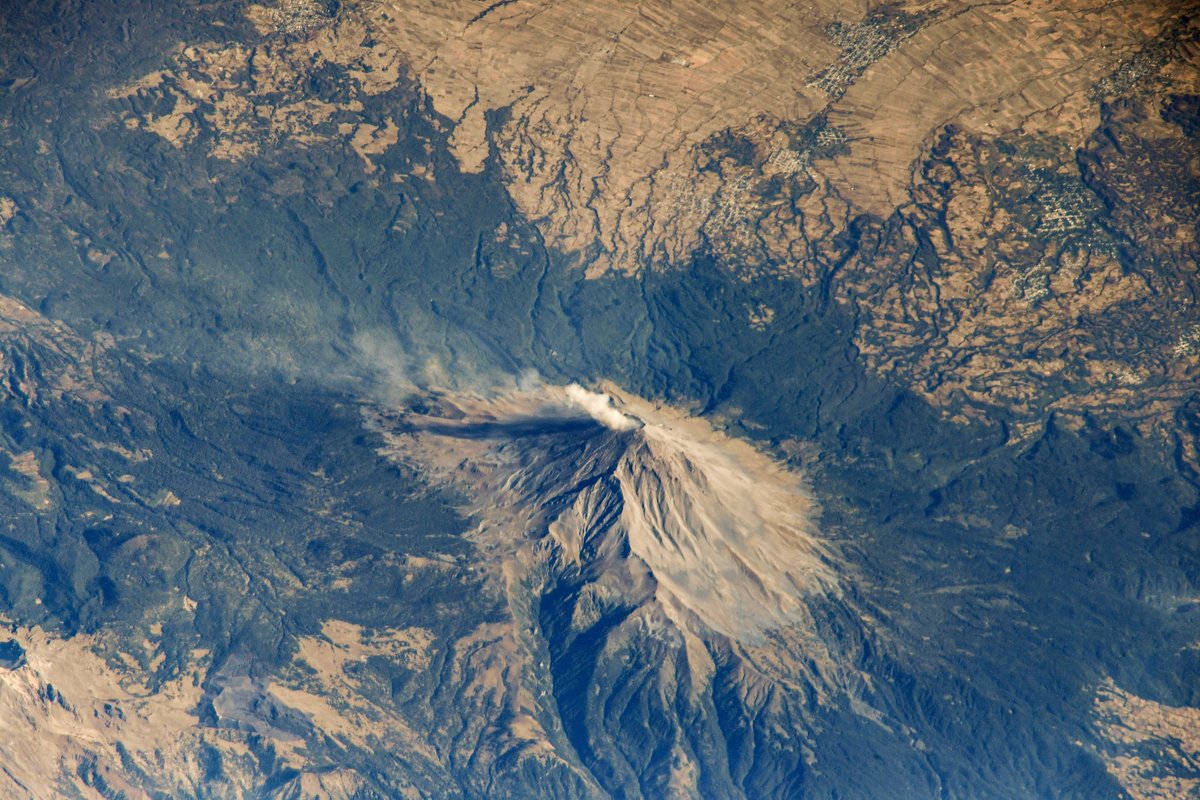 Space_Station's tweet photo. Active volcanoes are easy to spot from the space station and are frequently photographed by astronauts during an orbital flyover. More Earth pix... https://t.co/qcHlvByj8M https://t.co/aYLb7QxCZc
