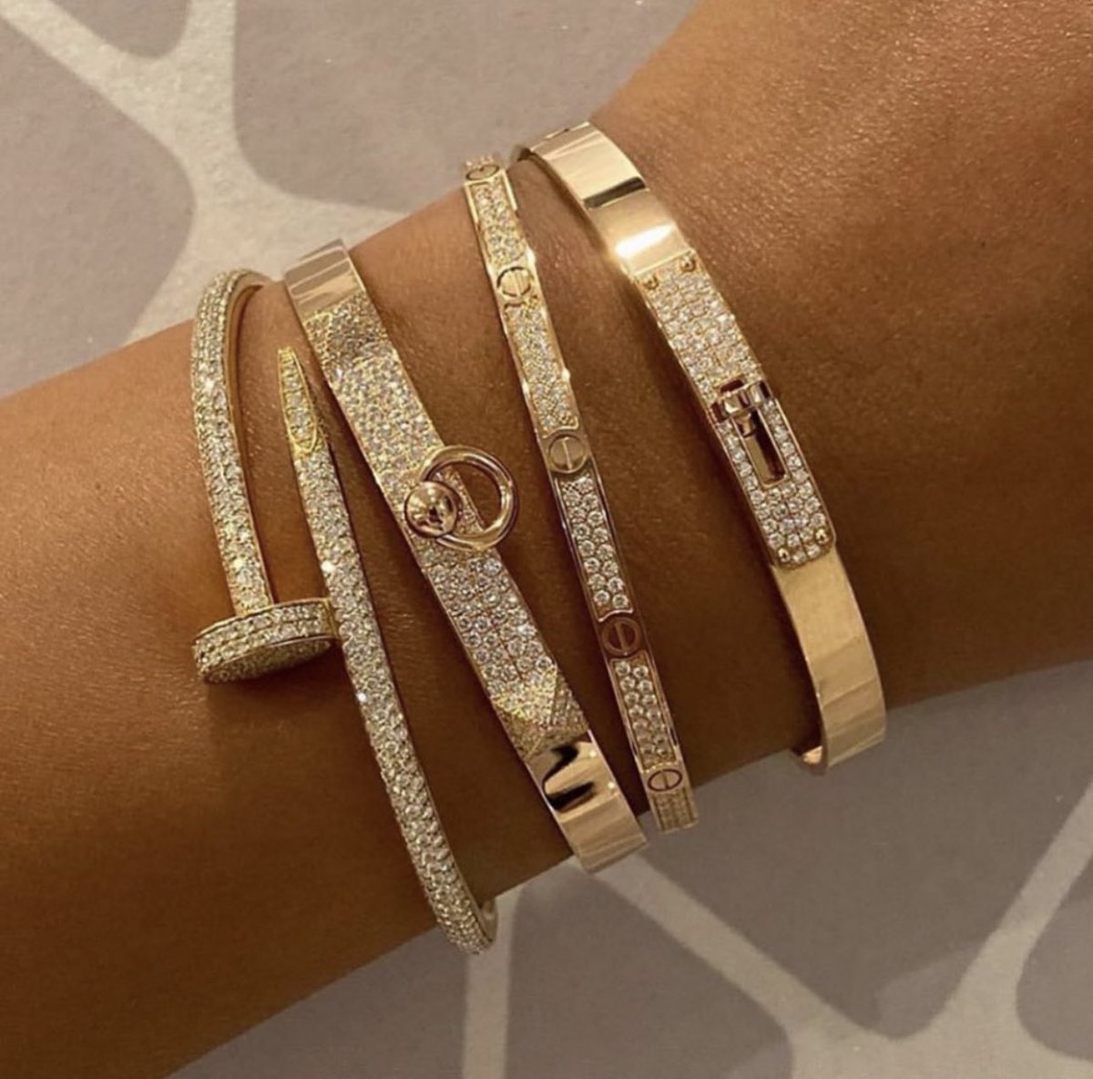 bottegalolita's tweet photo. Cartier bracelets https://t.co/93rTFTqLx2