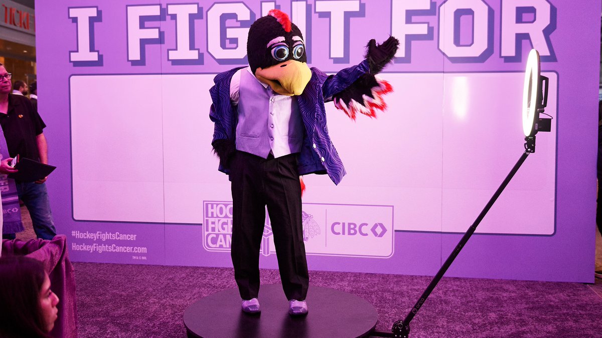 NHL's tweet photo. A special night at the United Center as the @NHLBlackhawks host their #HockeyFightsCancer game. 💜 https://t.co/V44wZg6269