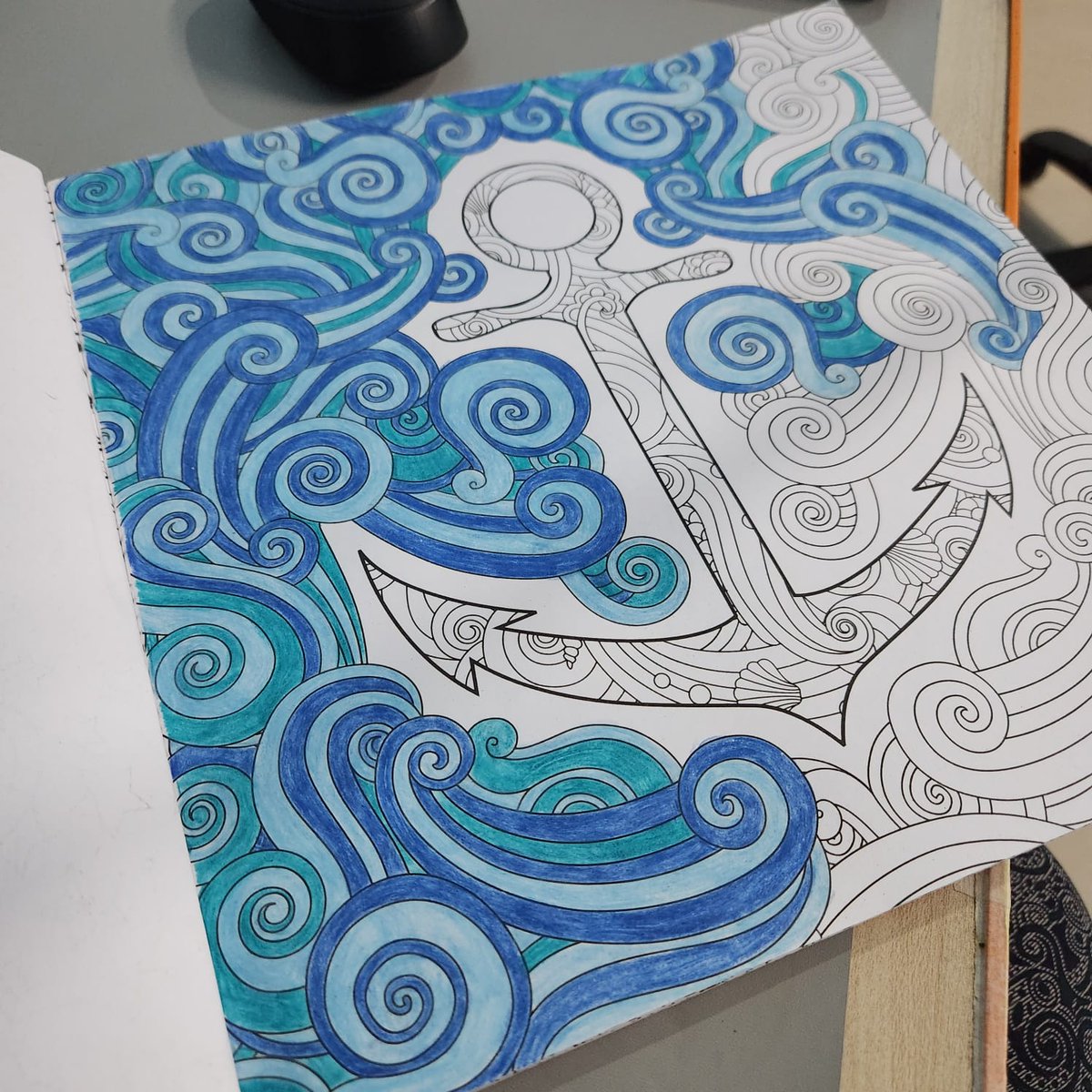 KeerthiValsan's tweet photo. Progress on the coloring! I am enjoying it too much. 

@STAEMars 

#coloring #Colors #coloringbookforadults #coloringbook    #ArtistOnTwitter #Artist #art #blue #seacolor #sea #waves #color #artbook https://t.co/GuxxruHrCP