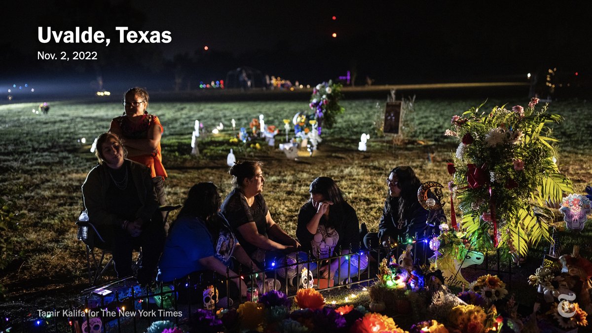nytimes's tweet photo. The graves in Uvalde, Texas, were decorated with ofrendas. People carried photos of the children or wore images of them on their T-shirts. This night of Día de los Muertos, or Day of the Dead, was a celebration of the 21 short, bright lives taken too soon. https://t.co/hxMHDQtWV2 https://t.co/Jq3dtNKg2r