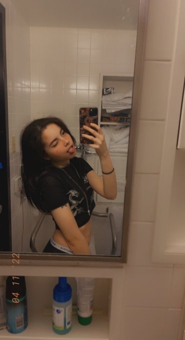 Tbh idk what I was doing but I was high as hell and I was looking how long my hair is bc yes, im growing