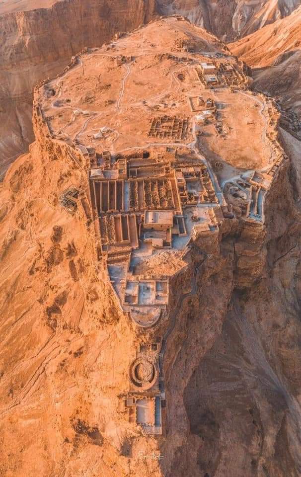 Masada, a rugged natural fortress, in Judaean Desert overlooking Dead Sea. It is a symbol of ancient kingdom of Israel, its violent destruction and last stand of Jewish patriots in face of Roman army in 73 AD. #archaeohistories