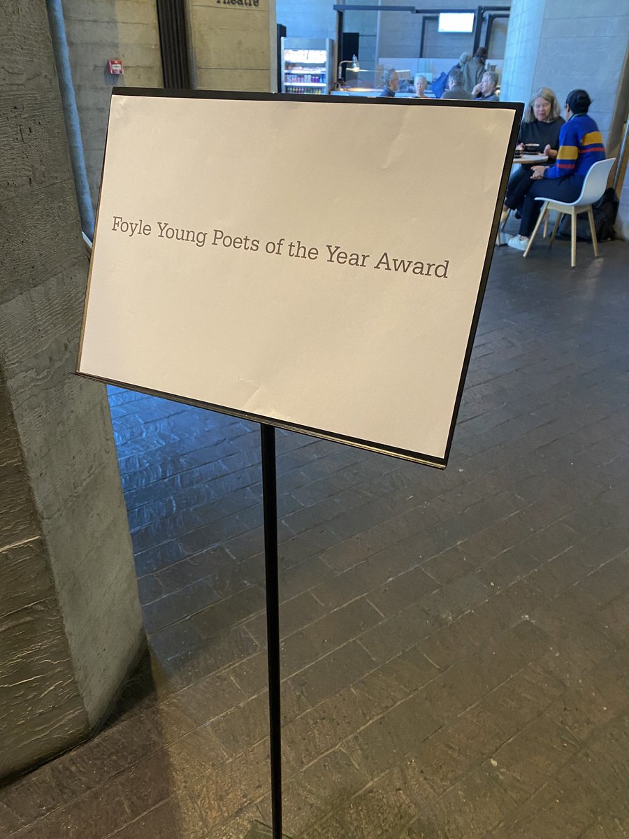 Big day today! #FoyleYoungPoets Awards @NationalTheatre @PoetrySociety I am in charge of standing by this sign.