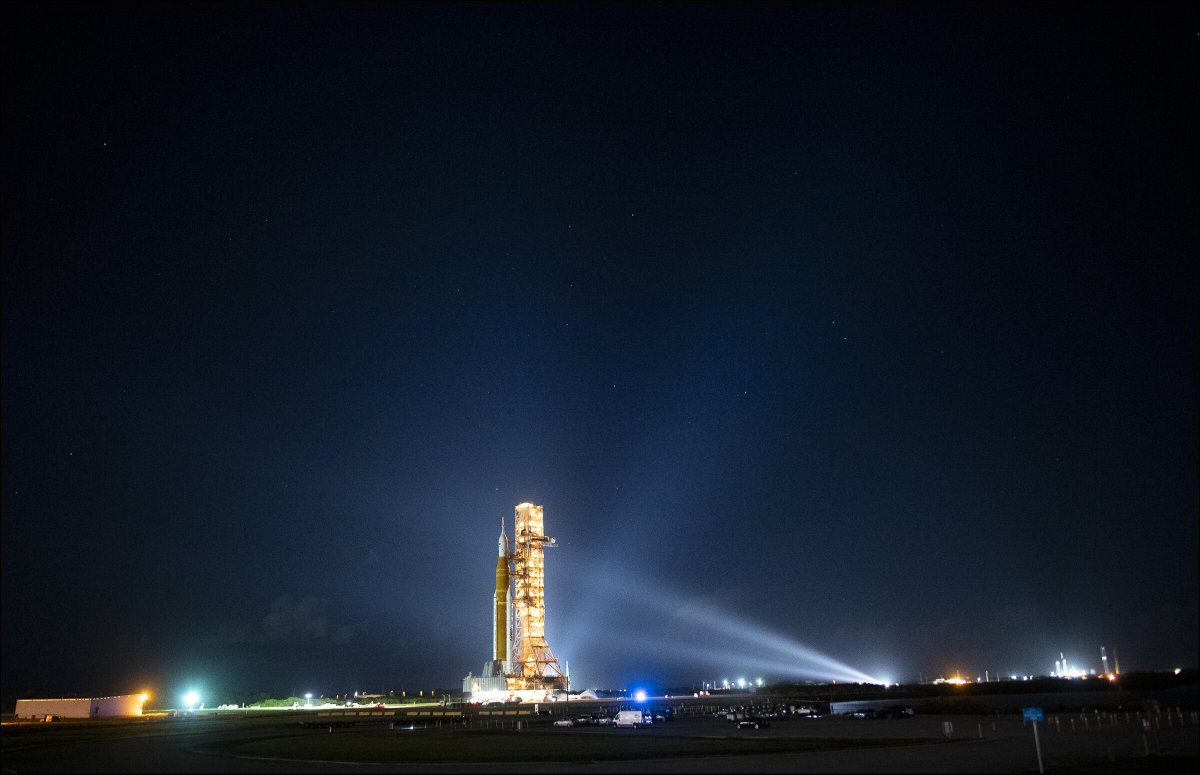 nasahqphoto's tweet photo. Check out the first images of @NASA_SLS and @NASA_Orion as they begin the approximately 4 mile journey to Launch Pad 39B aboard Crawler Transporter-2 📷-https://t.co/FYOW3RKU9A https://t.co/epni1Q2B95