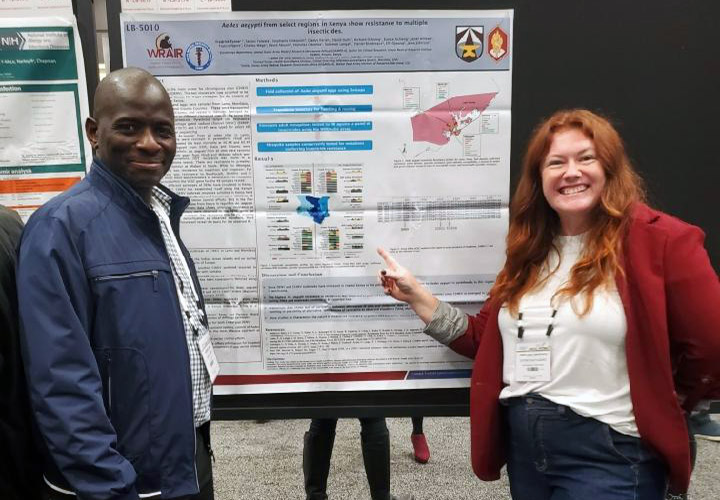 AFHSDPAGE's tweet photo. Navy Cmdr. Matthew Kasper, AFHSD's Global Emerging Infections Surveillance Branch Chief, is flanked by members of his staff at the @ASTMH Annual Meeting in Seattle, Wash. #TropMed22 @wrair https://t.co/mjHAEhaWfS