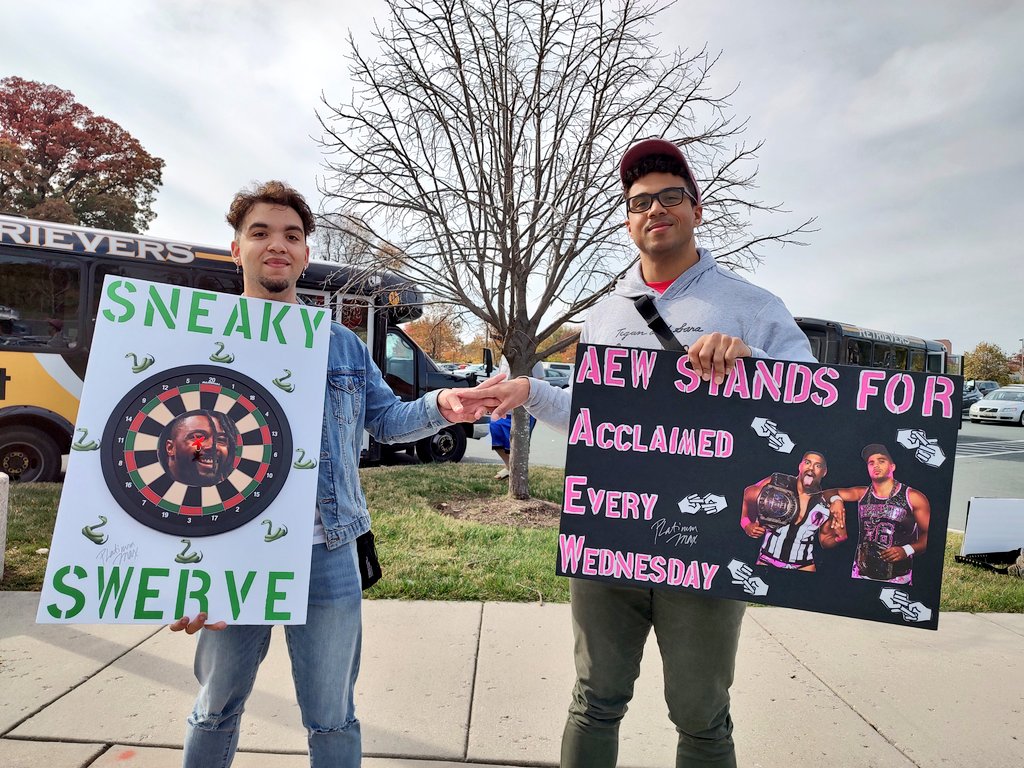 🗣️ YO! LISTEN! 🗣️ Thanks for the signs, Baltimore! You all made Billy Gunn's birthday very special 🥳 This fan put Sneaky Swerve's face on a dartboard & reminded us that AEW stands for Acclaimed Every Wednesday (THAT'S RIGHT)✌️✂️ Live #AEWRampage tonight on TNT #MicDrop 🎤⬇️💥