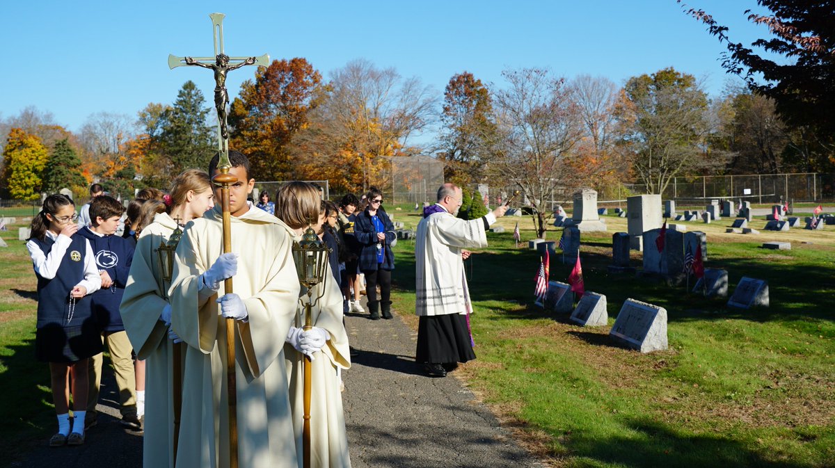 StCathTrumbull's tweet photo. Fr. Marcello led the middle school students at St. Catherine of Siena School in praying the Sorrowful Mysteries of the Rosary on Thursday on a walk through the Nichols Village Cemetery to pray for the faithful departed of the parish. https://t.co/JMfyrFh0Nd