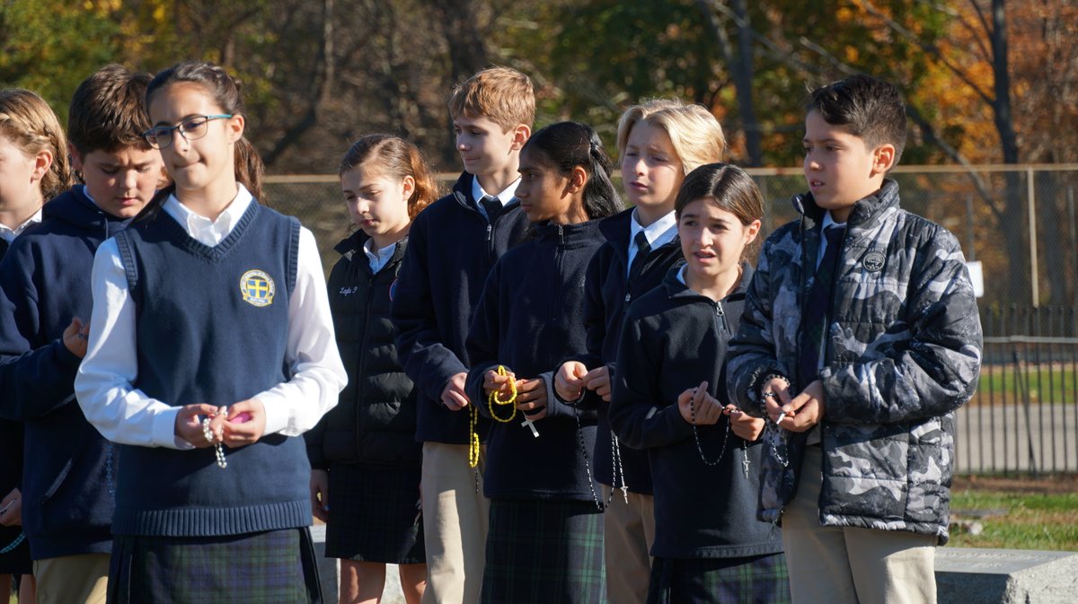 StCathTrumbull's tweet photo. Fr. Marcello led the middle school students at St. Catherine of Siena School in praying the Sorrowful Mysteries of the Rosary on Thursday on a walk through the Nichols Village Cemetery to pray for the faithful departed of the parish. https://t.co/JMfyrFh0Nd