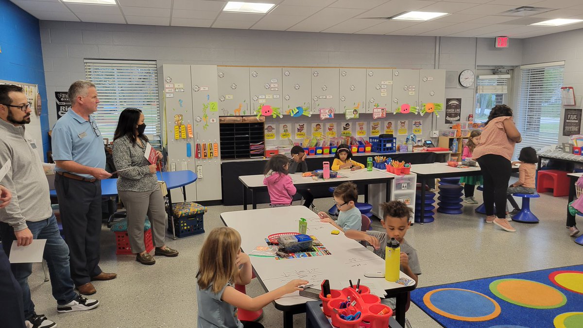 Woodridge68's tweet photo. First stop for today's Board Tour: @SipleySchool! Board members visited classrooms & heard about CHAMPS, Kagan & GRR #innovate68 #BoardTour https://t.co/CoOm970QvT