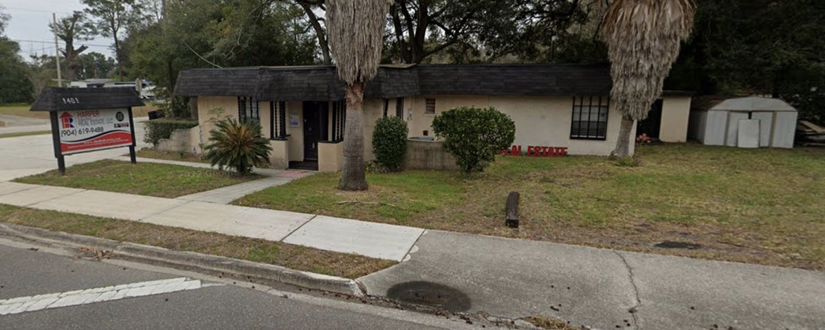 The last Duval County entry is the Poise School, offering classes in K-3 in this building, according to the FLDOE directory. The sign in front identifies the building as a real estate company.