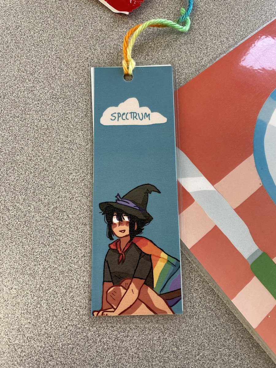 Lcleeth's tweet photo. Hosting a book tasting for Spectrum, our LGBTQ+/ally school group, today! One of the students created the bookmark design! https://t.co/gMZWv822nn