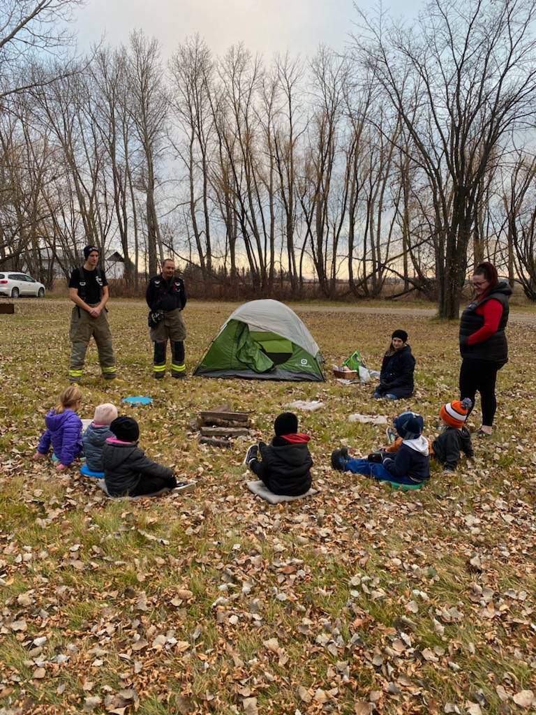 CBFireRescue's tweet photo. On Wednesday, firefighters Deyneka and Fraser visited the Bush Kids group at the campgrounds, speaking to them about campfire safety. https://t.co/xurRli1RGd