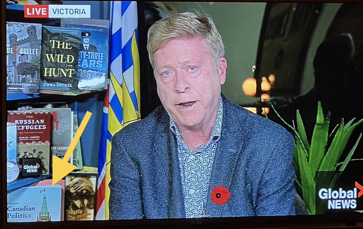 HamishTelford's tweet photo. I made it on to @keithbaldrey’s legendary bookcase! Super tickled and very grateful. Thank you Keith for promoting BC authors. And for your insightful reporting of course. #EngagingCanadianPolitics https://t.co/27d8jdBFhk