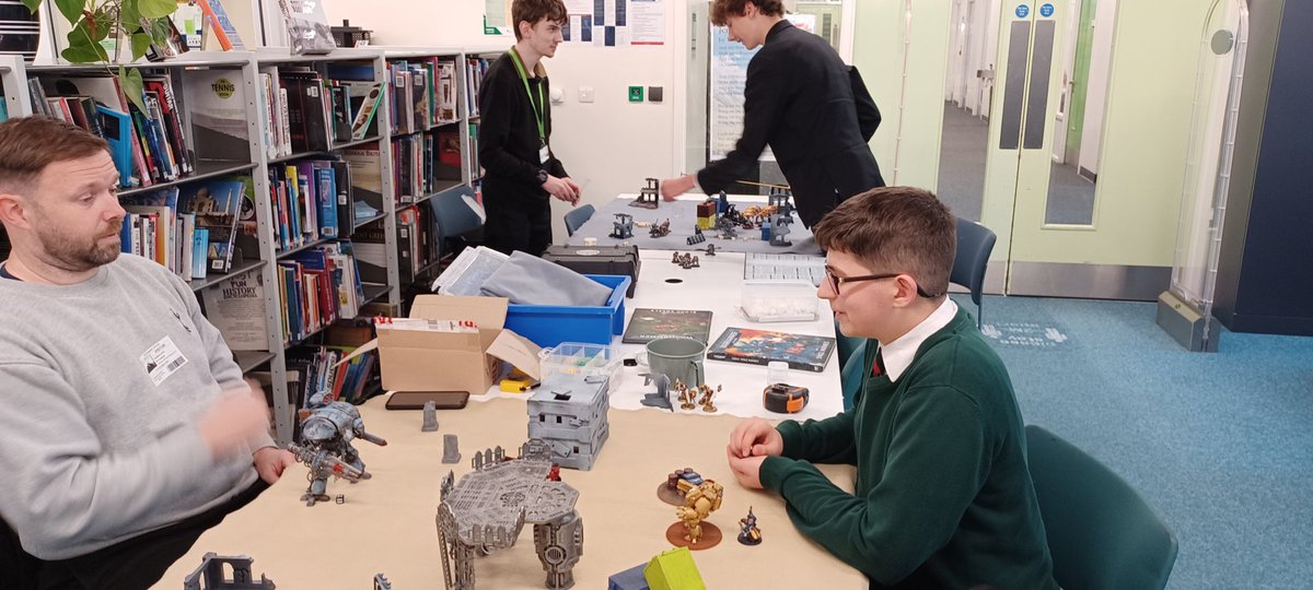 LibraryGoblin's tweet photo. Friday night library enrichment offer @elmgreenschool Young Writers in one room, and Warhammer in another. https://t.co/JPf7EQJheq