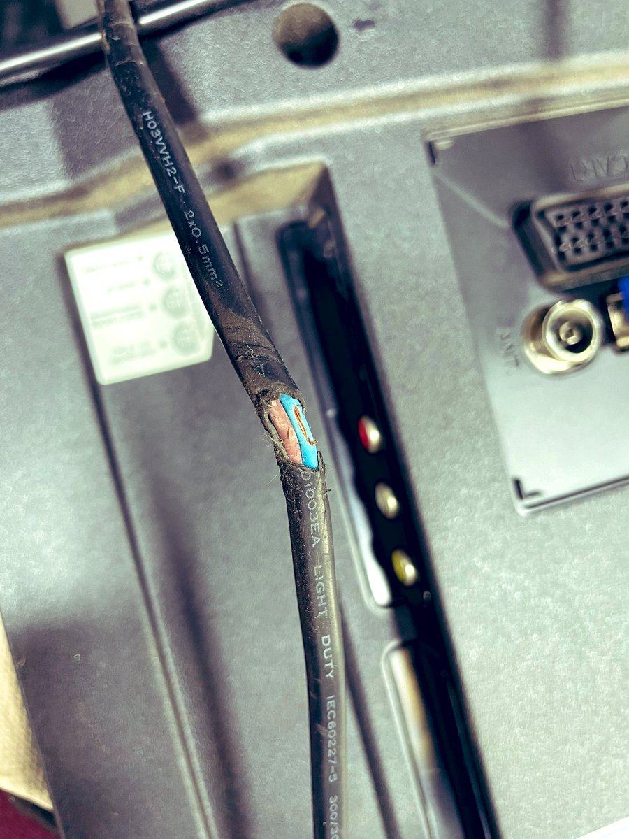 CardiffPATLtd's tweet image. A little later than usual but here’s your #FailOfTheWeek

If you’ve got a fancy wall mounted TV have you checked the cables?

This one was trapped between the wall bracket and the television, luckily the bare copper was against the plastic of the TV and not the metal mount