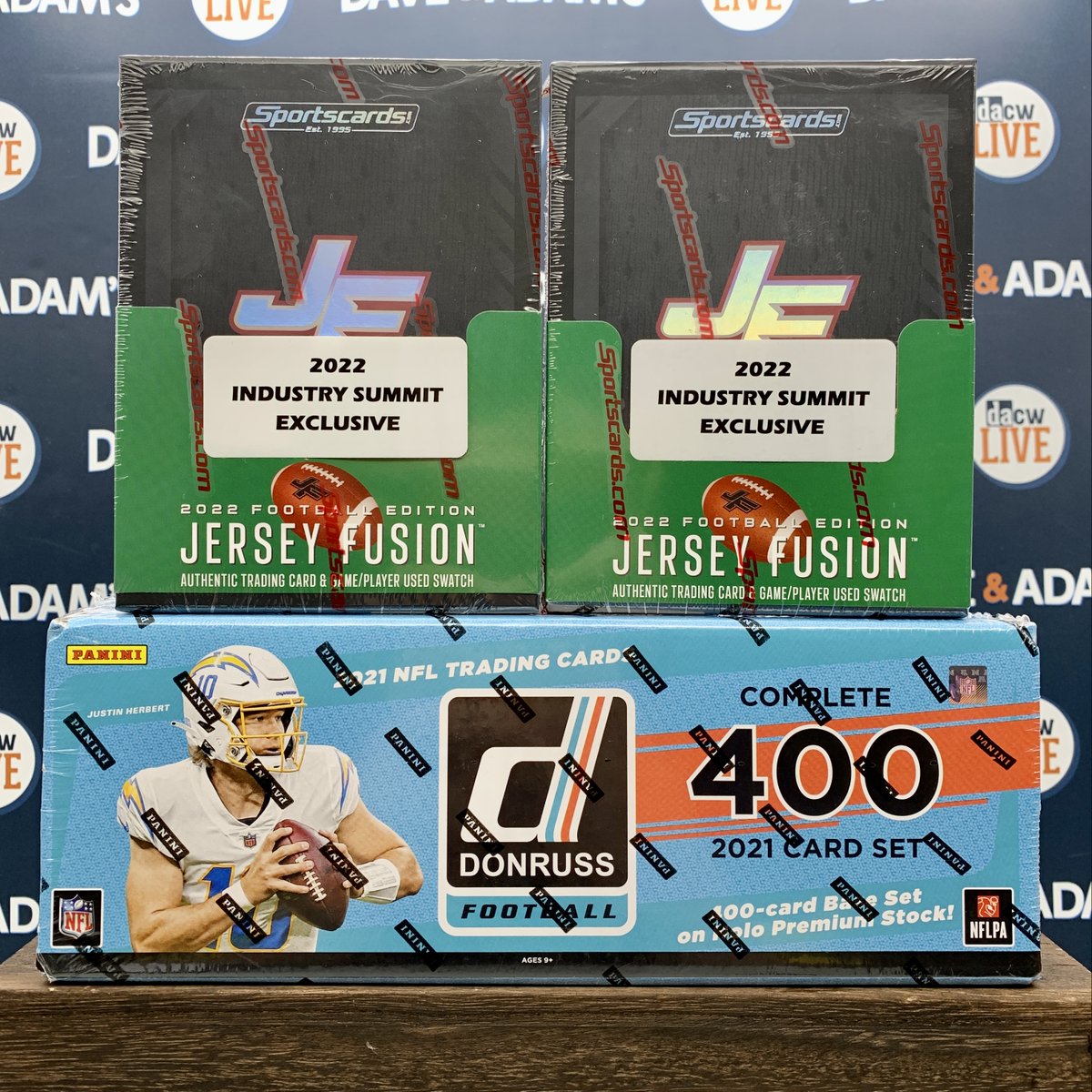 dacardworld's tweet photo. 🚨 NFL Week 9 Giveaway 🚨

1 randomly selected winner will receive this 2021 Donruss Football Holo Premium Stock Set &amp; 2x Jersey Fusion Industry Summit Boxes! 

To Enter:
• RT &amp; like this tweet
• Tag a friend 
• Follow us

Winner announced from all entries on Monday (11/7) 🏈 https://t.co/4iuJxLGzOy
