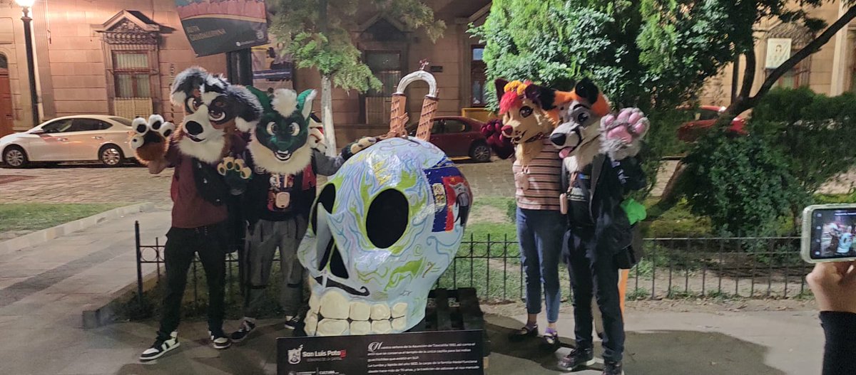 It is #fursuitfriday once again!! A few days ago, a group of friends and I embarked on a journey to find this one calaverita in particular, and we walked around a TON that day cx
🐶 <a href="/VladyzWild/">VladWild</a> <a href="/RedHoothoot/">Tori browses</a> 
🐲 <a href="/UndergroundPupp/">UndergroundPuppy (COMMS OPEN)</a> 
🦊 Me uvu (fursuit by <a href="/TxT_Creations/">T&T Noir Goat ASSOC.</a>)