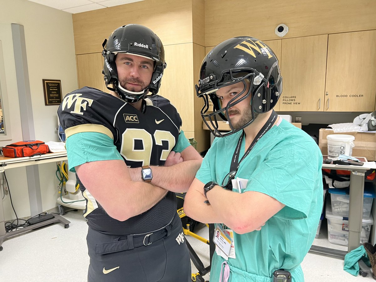 WakeACS's tweet photo. Put me in coach! Our first year fellows @FolletteCraig and @arthur_d_grimes helping as the football trauma “sim man” for the general surgery residents today during their simulation session. Hey @WakeFB, you all need any subs? @WakeSurgEd @NCSurgeons @AtriumHealthWFB https://t.co/KonesuMJNH