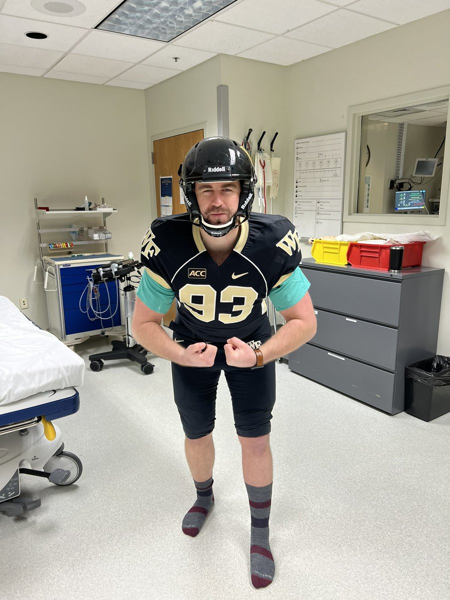 WakeACS's tweet photo. Put me in coach! Our first year fellows @FolletteCraig and @arthur_d_grimes helping as the football trauma “sim man” for the general surgery residents today during their simulation session. Hey @WakeFB, you all need any subs? @WakeSurgEd @NCSurgeons @AtriumHealthWFB https://t.co/KonesuMJNH