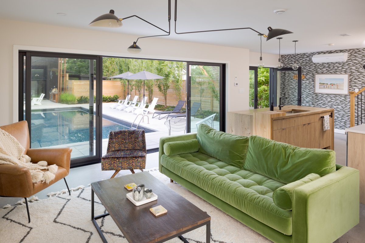 The custom designed guest house pictured here includes an open floor plan with 15 ft glass sliding doors perfect for maintaining a natural flow and undisrupted views from indoors to outdoors.

For more of our renovation work visit: wentworthlandscapes.com/interiors